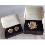 Sarah Coventry 1966 brooch & clip earrings in 'Waterlily' design in original boxes.