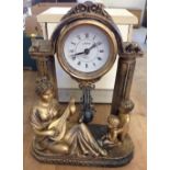 A modern Quartz gilt mantle clock.