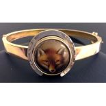 A 15ct gold Essex crystal bracelet with central circular painted face of a fox with white gold