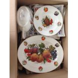 A bone china dinner & tea servie in a fruit pattern.