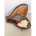 Modern carved Meerschaum pipe with lions head, in a fitted case.
