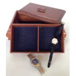 A vintage wooden jewellery box containing a Raymond Weil Ladies 18ct gold plated watch No. 9955