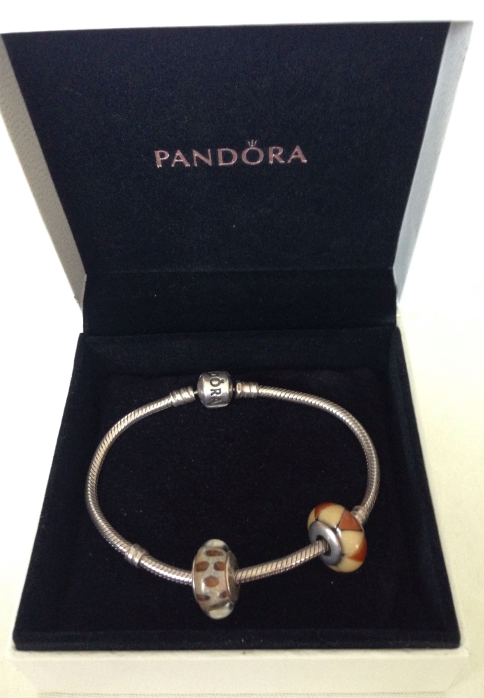 Boxed Pandora bracelet 19cm long with 2 Pandora glass charms