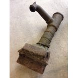 A vintage cast iron water pump approx 45cm tall.