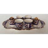 A Royal Winton Ivory ware boiled egg set comprising 4 egg cups, salt & pepper shakers & tray.
