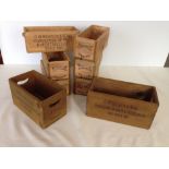 Set of 8 small wood boxes.