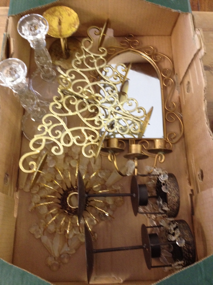A box of candlesticks & candle holders to include metal & glass.