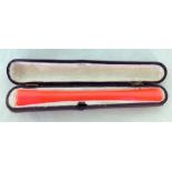 An unusual Art Deco cheroot/cigarette holder in its original case. Made from bakelite or early