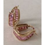 A pair of 9ct gold and pink sapphire horseshoe shaped earrings approx 3.9g