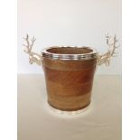 Modern wooden wine cooler with silver plated stag decoration.