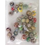 A bag of approx 40 murano glass beads with silver cores.