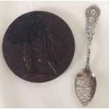 A bronze Columbian Exposition commmemorative medal and silver spoon c1893 commemorating the 400th