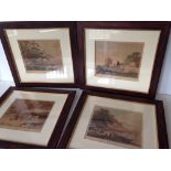 A set of 4 framed & glazed coloured prints of the 4 seasons. 44 x 48cm.
