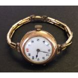 Ladies vintage Rolex 9ct gold cased watch with rolled gold strap. Dial with red enamelled number 12.