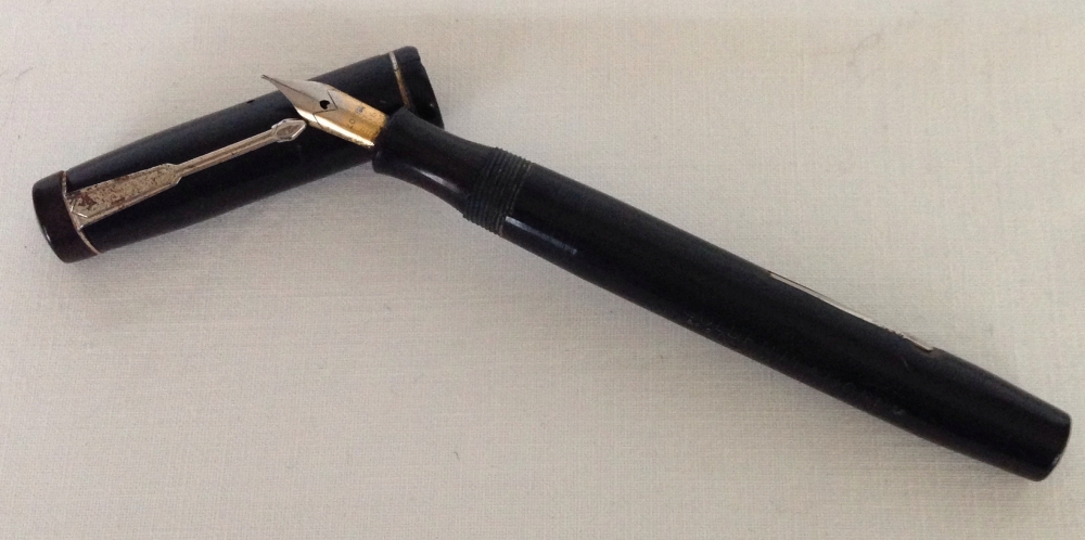 A Golden Platignum fountain pen.