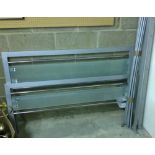 A metal & glass bed frame.