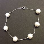 A 925 silver and pearl bracelet, approx length 18.5cm