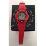An unused boxed Casio G-shock digital red watch with another unboxed. Both in working order with
