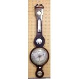 An antique mercury barometer with convex mirror insert, banding to edge & carved finial.