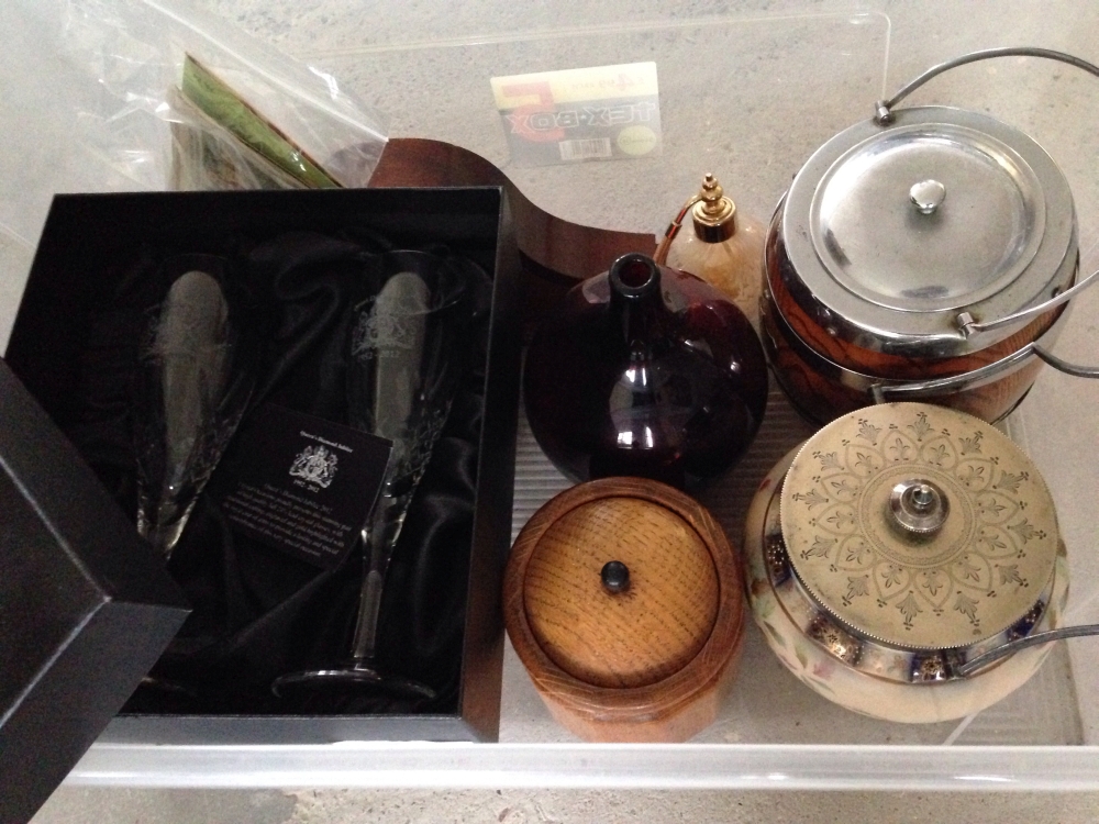 A box of mixed items to include a Carlton ware Biscuit barrel, comic postcards, glass perfume