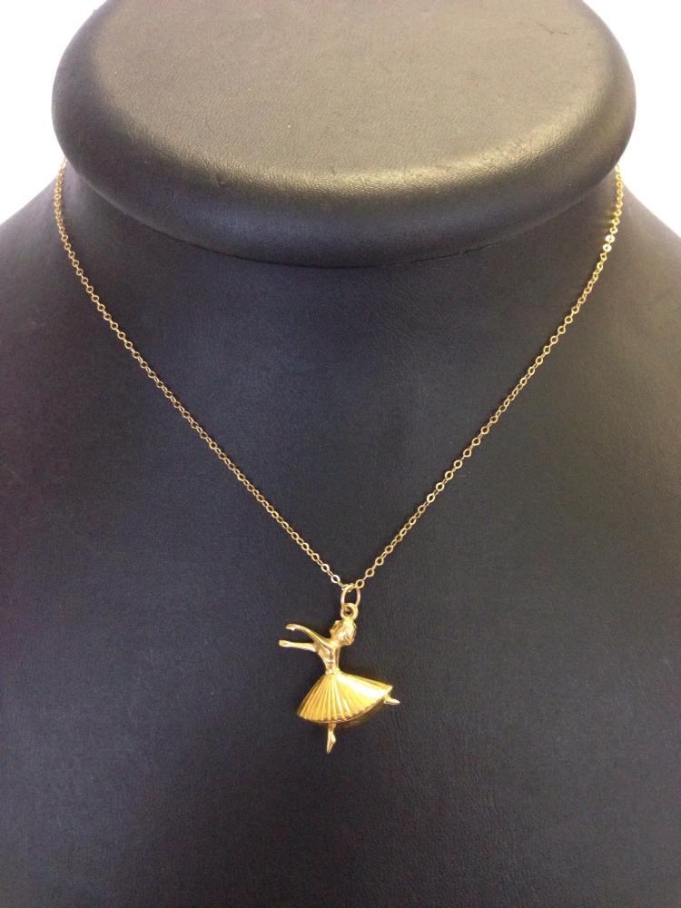 Hallmarked 9ct gold ballerina pendant on gold chain. Weight approx 2g