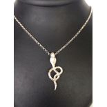 Cobra snake/serpent hallmarked silver pendant on 22" silver chain.  Approx weight 13g