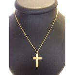 A 9ct gold cross & chain with engine turned engraving, cross measures 3cm long, total weight