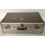A c1930s RIMOWA alluminium suitcase.