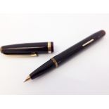 Mentmore ‘Diploma’ Fountain Pen c1950s.Dark brown celluloid with gold filled trim. Grooved gold