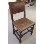 A leather upholstered vintage hall chair.