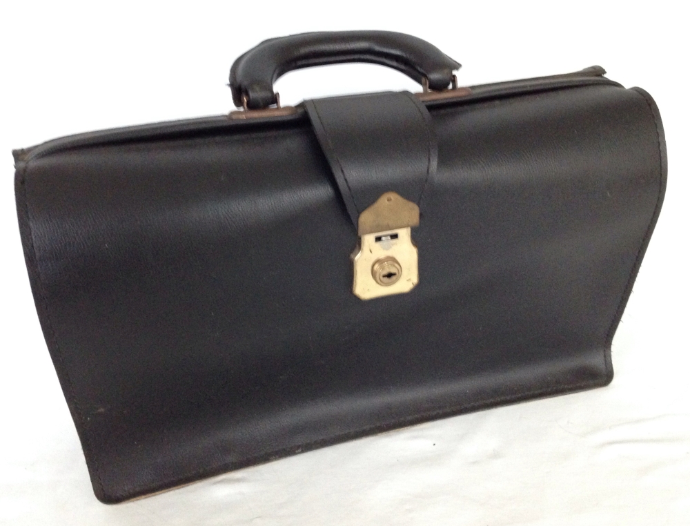 A vintage black leather briefcase.
