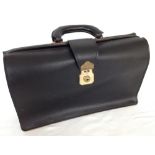 A vintage black leather briefcase.