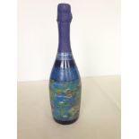 A bottle of Luna Nouva Prosecco & Pinot in a collectable bottle decorated with Claude Monet painting
