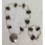 Necklace and bracelet set in white metal with green agate stones.