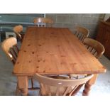 A pine kitchen table & 6 chairs, 152cm x 91cm.