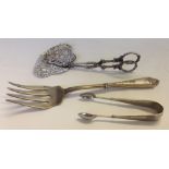 3 silver items to include sugar tongs, silver handled serving fork and asparagus tongs (a/f)