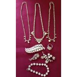 Collection of Diamante costume jewellery to include 3 necklaces, a bracelet and 3 brooches.