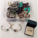 A box of costume jewellery to include abalone shell bracelets and a rolled gold ring.