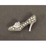 Pretty silver marcasite brooch in the form of a ladies stilletto shoe, set with an amethyst.