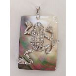 Silver and albalone shell large pendant featuring a frog figure set with crystals. Approx 6cm long.