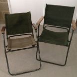 2 folding military camping chairs.