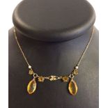 16" 9ct gold necklace set with topaz.