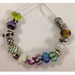 19 Murano glass and 925 silver charm beads.