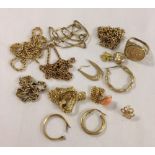 A bag of approx 30g of scrap gold, mostly 9ct.