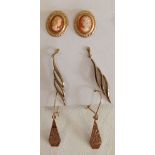3 pairs of gold earrings including 2 pairs of drop earrings and a pair of stud earrings with central