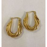 A pair of large 9ct gold hooped earrings, 2.5cm long.  Approx weight 2.1g