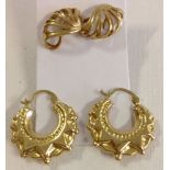 2 pairs of 9ct gold earrings - stud earrings with a wave design measuring 1.5cm across & a pair of