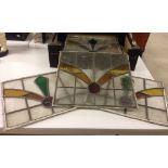 A box of approx 9 1930's/40's stained glass windows.  Sizes approx 44cm x 38cm.