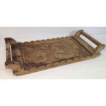 A carved wooden tray.