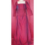 New and unused wedding gown by Anu Pam.  In burgundy silk with rich deep panel, fine embroidery